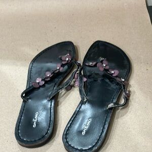 Black flat with butterfly decor